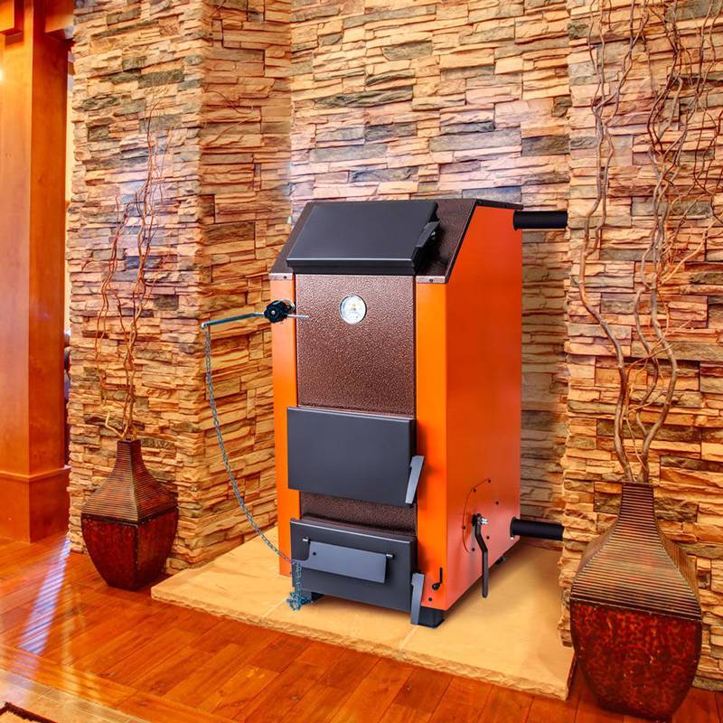 Выбираем дровяной котел длительного горения для отопления дома
