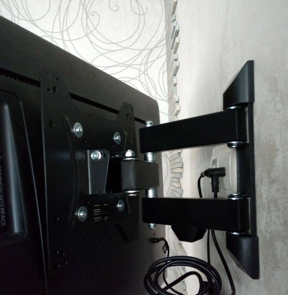 Крепление для телевизора на стену: выбор и установка крепежа